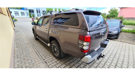 Keménytető és rakodórúd felszerelése a Mitsubishi L200 2021-re
