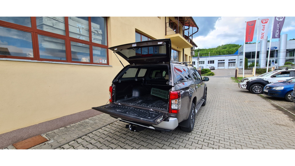 Keménytető és rakodórúd felszerelése a Mitsubishi L200 2021-re