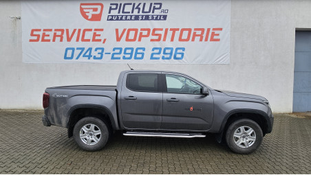Bed liner, roll cover, side steps installed on Volkswagen Amarok 2023