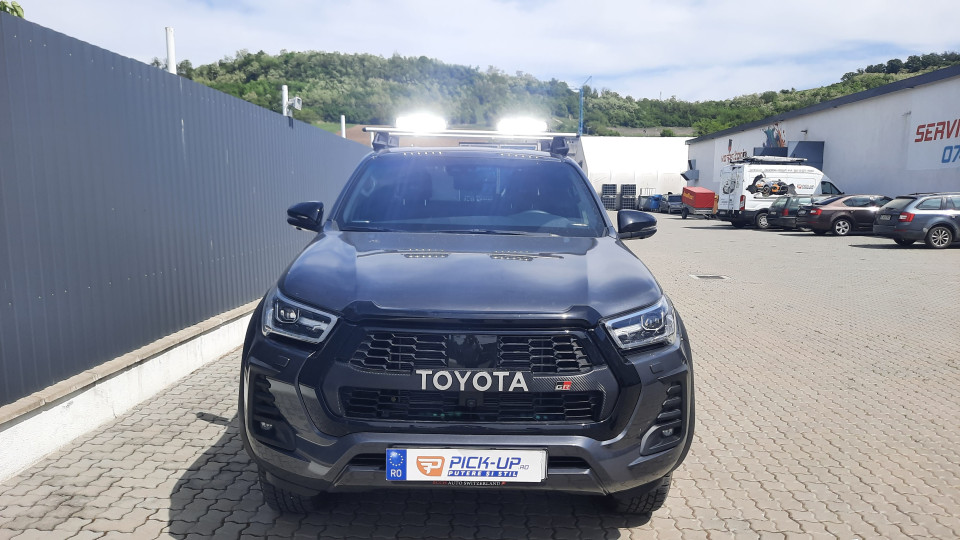 Cross Bars, sport lights installed on Toyota Hilux 2023