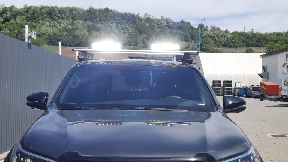 Cross Bars, sport lights installed on Toyota Hilux 2023