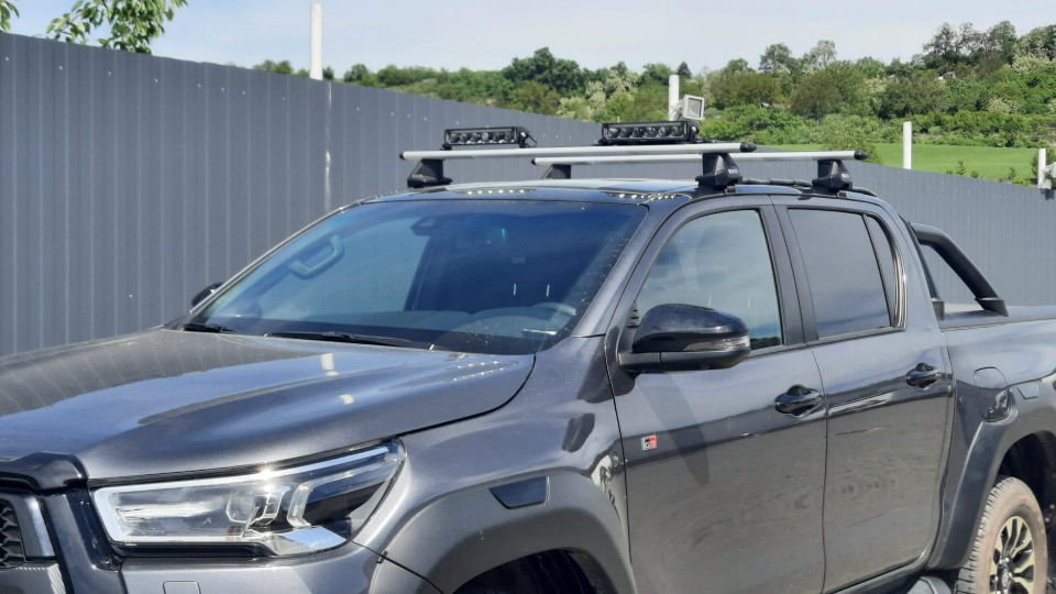 Cross Bars, sport lights installed on Toyota Hilux 2023