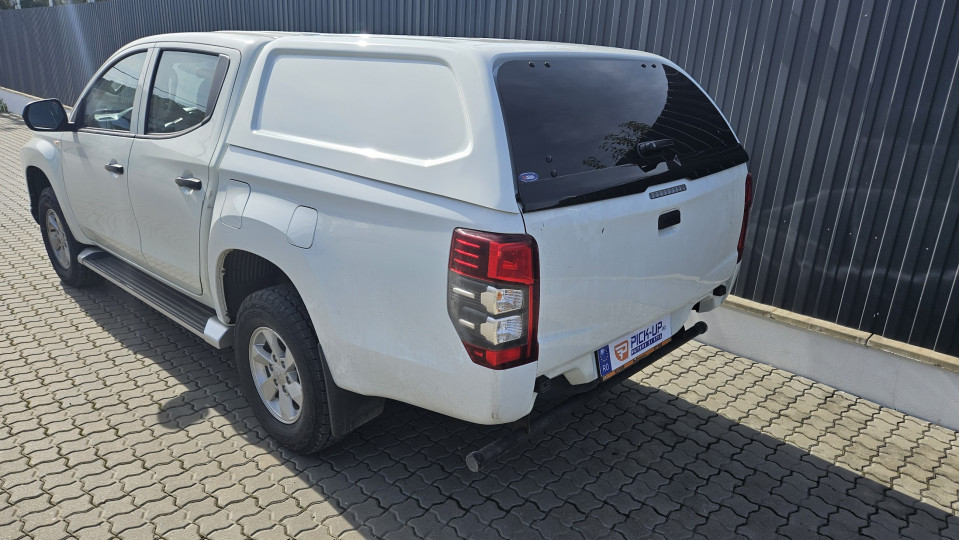 Keménytető és platóbélés beszerelése a Mitsubishi L200 2020-ra